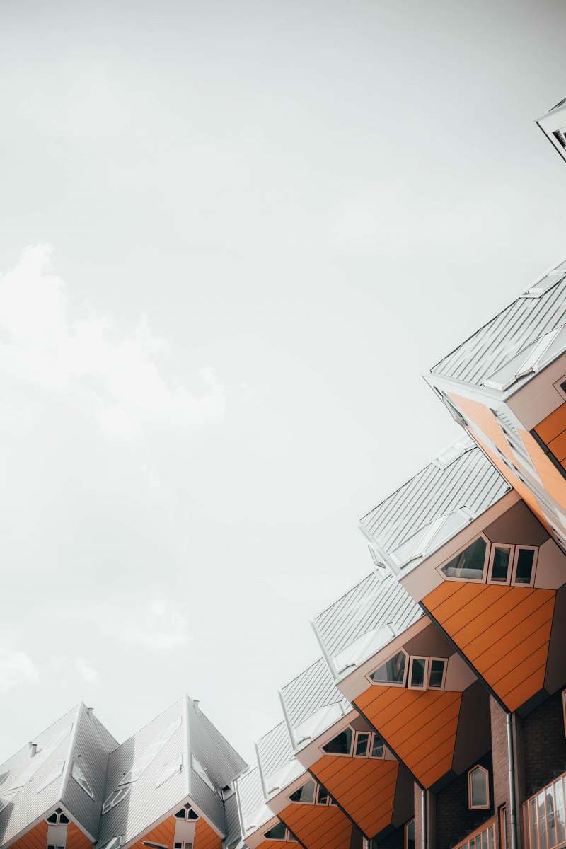 rotterdam white and orange wooden houses netherlands